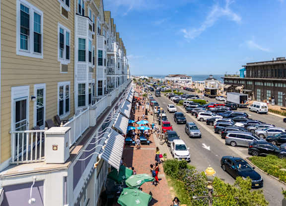Coastal street view with shops and parking at Pier Village Apartments, New Jersey, 7740
