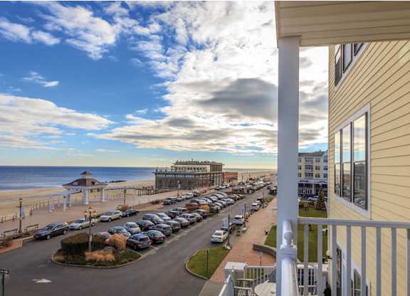 Oceanfront balcony view with beach access at Pier Village Apartments, New Jersey
