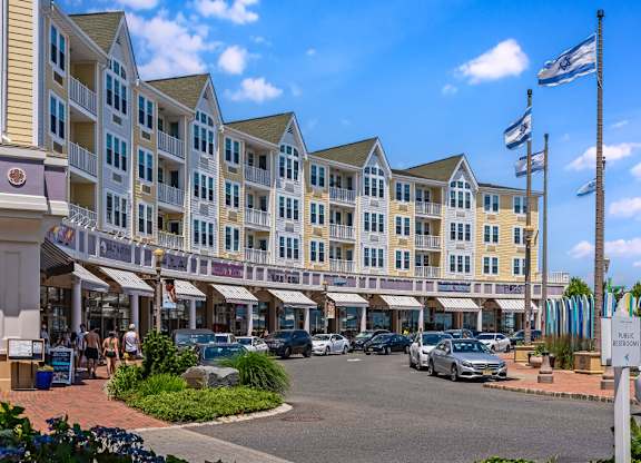 Retail with apartments and flags at Pier Village Apartments, Long Branch, New Jersey