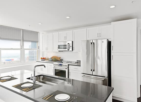 Kitchen area with appliances at 65 Bay Street, New Jersey, 07302