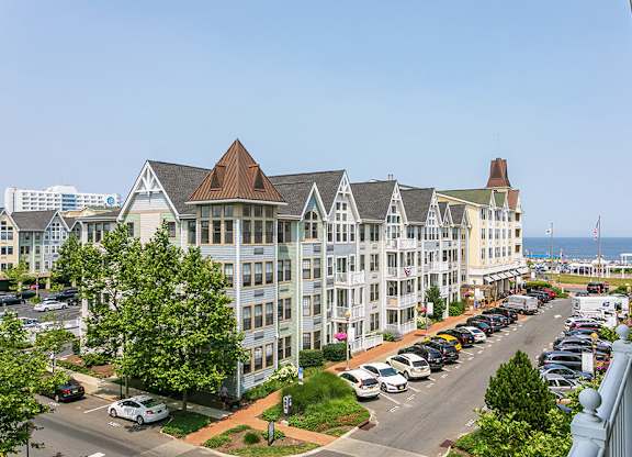 Coastal town parking area with ocean view at Pier Village Apartments, New Jersey