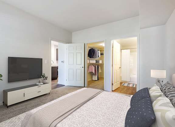 Bedroom With TV at The Apartments at Cambridge Court, Rosedale