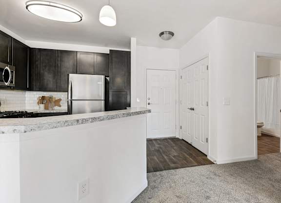 Kitchen And Living Area at The Apartments at Cambridge Court, Rosedale, MD