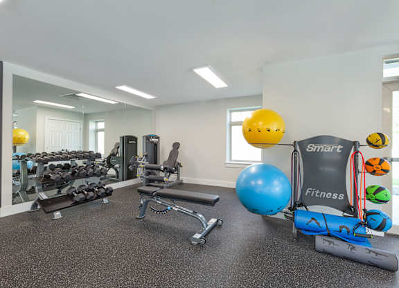 the preserve at ballantyne commons fitness room with weights and cardio equipment at Copper and Quarry Village, Maryland