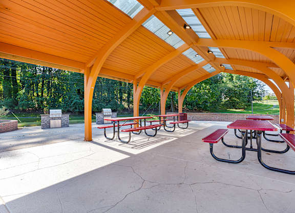 a covered picnic area with benches and tables at Copper and Quarry Village, Maryland, 21209