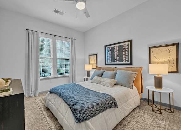 A Bedroom with a Large Bed at District 757 Apartments, Norfolk, VA, 23502