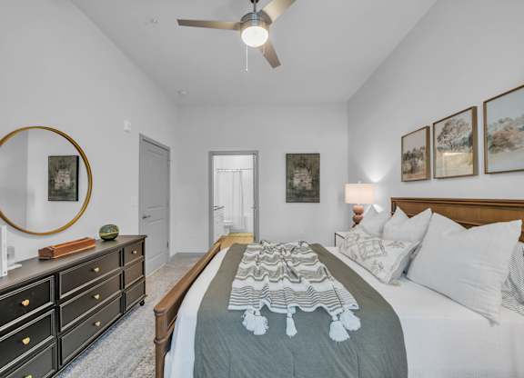 A Bedroom with a Dresser at District 757 Apartments, Virginia, 23502