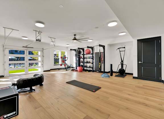 A Gym with a Yoga Mat at District 757 Apartments, Virginia, 23502