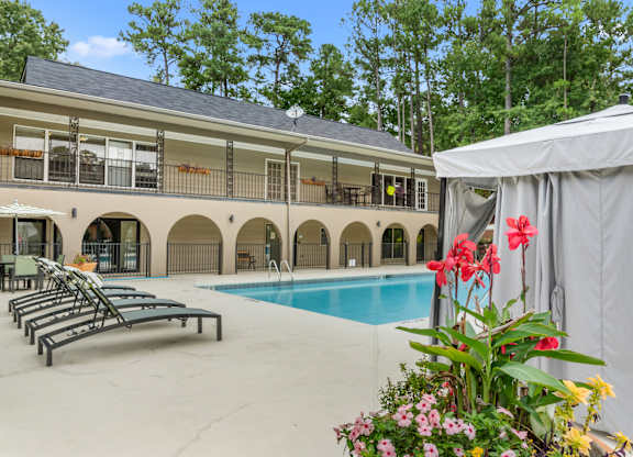 Pool With Sun Loungers at Riverchase Landing Apartments, Alabama