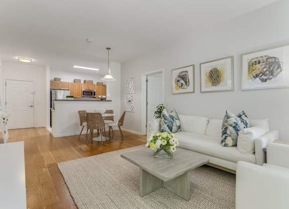 Open living dining and kitchen with hardwood floors at Pier Village Apartments, Long Branch, NJ 7740
