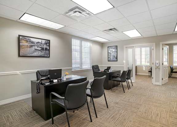 Professional office reception area with modern seating at The at Elmwood Terrace Apartments, Maryland