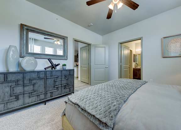 Bedroom with bed, lampsat Estraya Westover Hills, San Antonio at Estraya Westover Hills, San Antonio