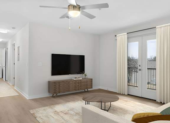 A modern living room with a flat screen TV and a brown sofa at Grand at Pearl Apartments, Mississippi, 39208