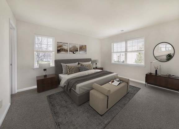 Bedroom with cozy bed and window at The Apartments at Owings Run, Owings Mills, 21117