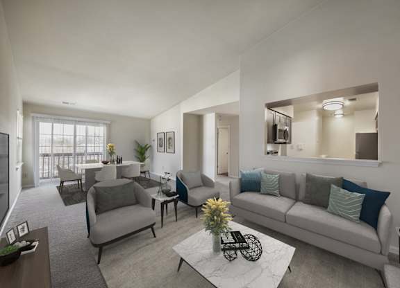 Living with couch and table and television at The Apartments at Owings Run, Maryland