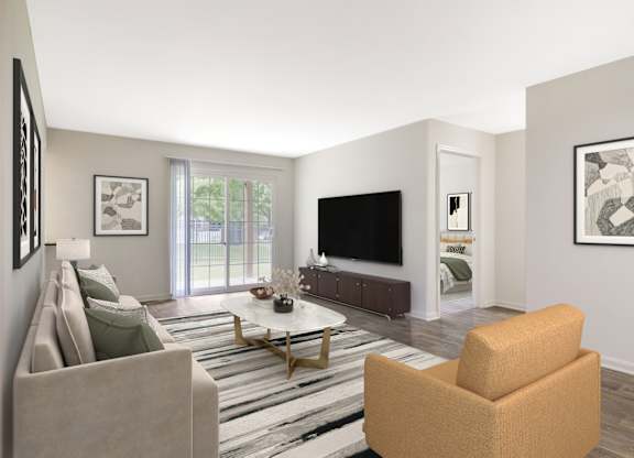 Living Room With TV at The Apartments at Owings Run, Maryland