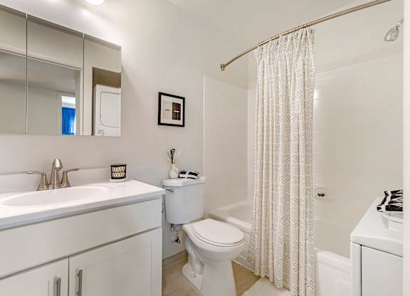 a bathroom with a sink toilet and a shower at Quail Ridge, Plainsboro Township, New Jersey