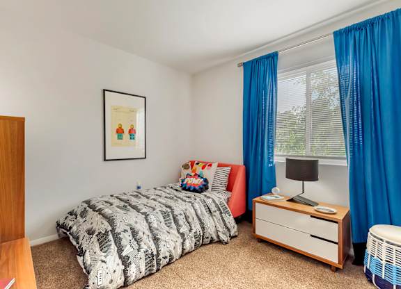 a bedroom with a bed and a dresser and a window at Quail Ridge, Plainsboro Township, NJ, 08536
