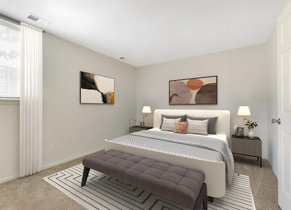 a bedroom with a large bed and two windows at Copper and Quarry Village, Maryland