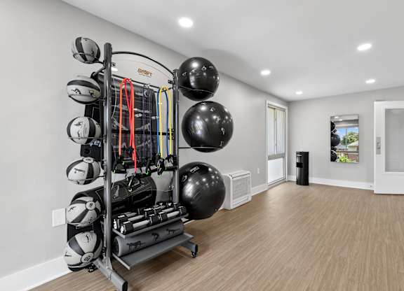 A home gym with a variety of exercise equipment.