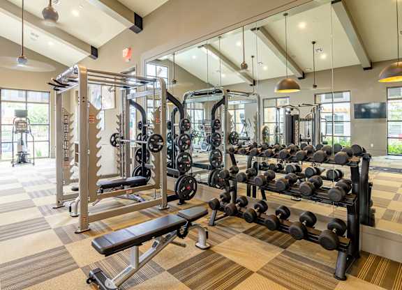 Free Weights And Cardio Equipment at Stone Loch Apartments, Tomball, TX 77375