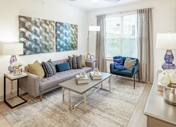 Living room at Stone Loch Apartments, Tomball, TX