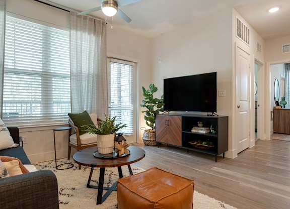 Living room with couch and tv at The Mason at Fremaux Park, Louisiana, 70458