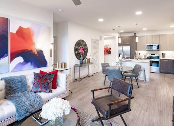 Living room area with couch at The Rosemary Apartments, Humble, TX, 77346