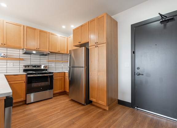 Kitchen with Cabinets at The Yard Apartments, Louisville, KY