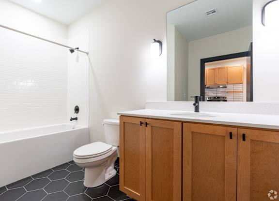 Bathroom with tub at The Yard Apartments, Louisville, KY
