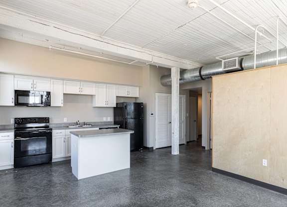 Kitchen with cabinets at Wheelhouse Lofts, Ohio, 45402