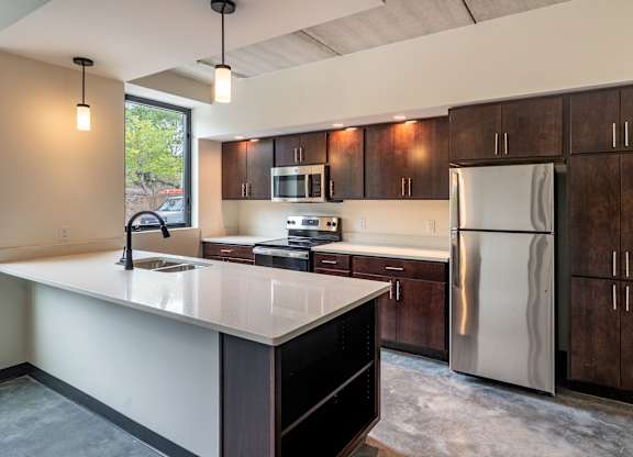 Kitchen with fridge at The 503 Apartments, Dayton, OH