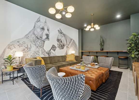 A drawing of a dog with stars on its body is on the wall.
