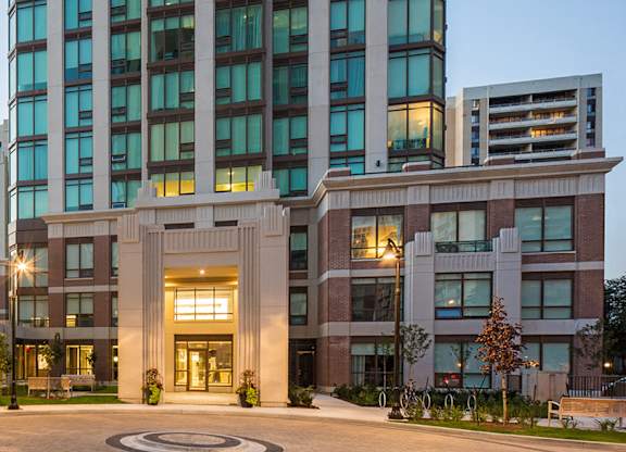 A modern building with a circular courtyard in the center.
