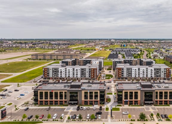 an aerial view of an urban area with buildings and cars at EagleRidge Plaza Residences, North Dakota, 58104