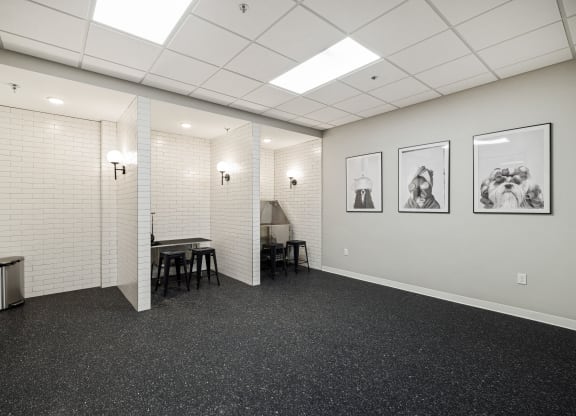 an empty room with white walls and a table and chairs at EagleRidge Plaza Residences, Fargo, ND, 58104