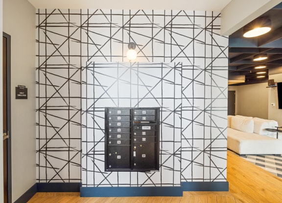 a wall in a room with a black geometric pattern on it at EagleRidge Plaza Residences, North Dakota, 58104