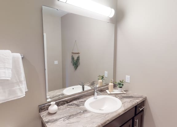 Bathroom With Vanity Lights at The Haven on Veterans, North Dakota, 58104