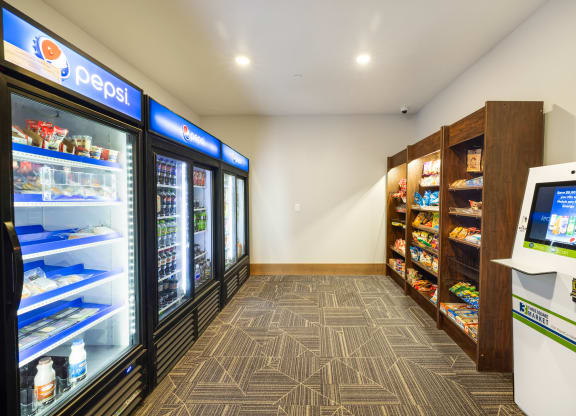 a convenience store with refrigerators and a vending machineat Northern Lights a Lifestyle-Driven Community, West Fargo, 58078