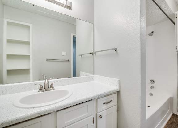 a bathroom with a sink and a shower and a toilet at Foxborough Apartments, Irving, TX, Texas, 75061
