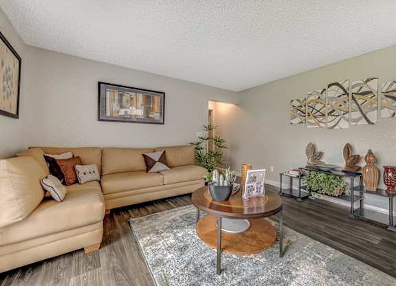 a living room with couches and a coffee table at Desert Bay Apartments, Laughlin, Nevada