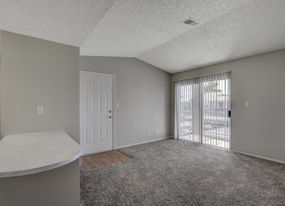 living room with large window at Citrus Apartments, Las Vegas,89101