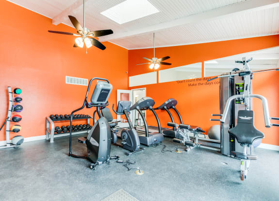 the gym has plenty of exercise equipment for your workouts at Falls on Clearwood Apartments, Richardson, TX, Texas