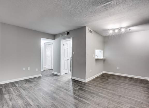 Wood Floor Living Room at Bellaire Oaks Apartments, Houston, Texas