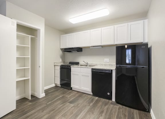 Empty Kitchen with Refrigerator at Valencia Park, Phoenix, Arizona