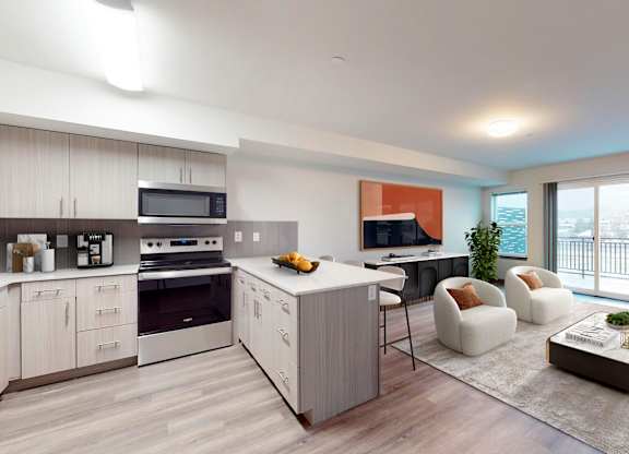 A modern kitchen with a dining area and a living room.