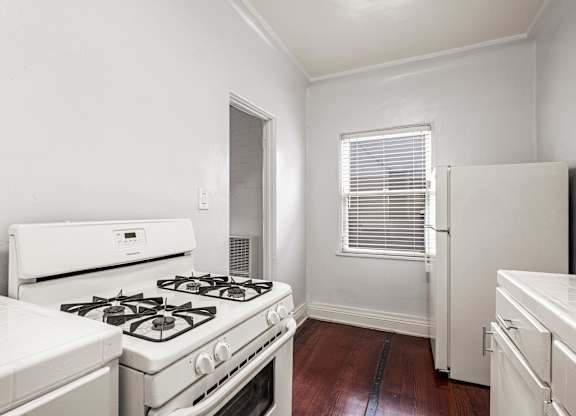 A white kitchen  at Normandie Summit Apartments, Los Angeles, CA