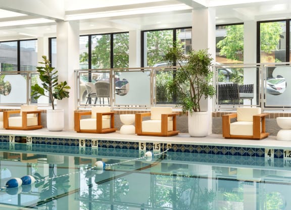 swimming pool with chairs and a water feature at Vision on Lombard, Baltimore, MD 21201