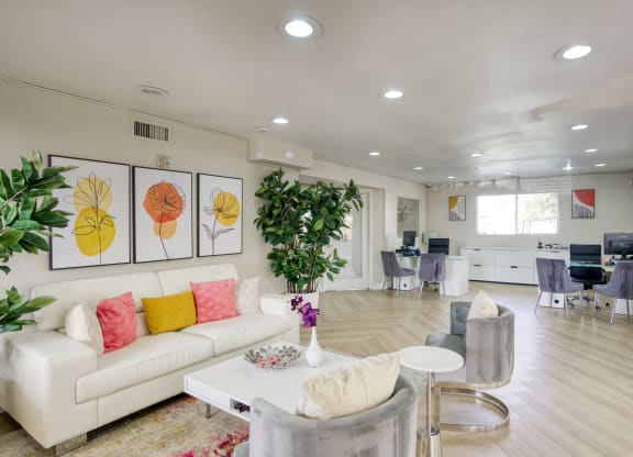 a living room filled with furniture and a large window at Valencia Park, Phoenix