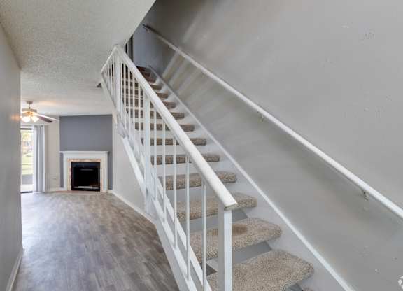 the stairway up to the second floor of a house